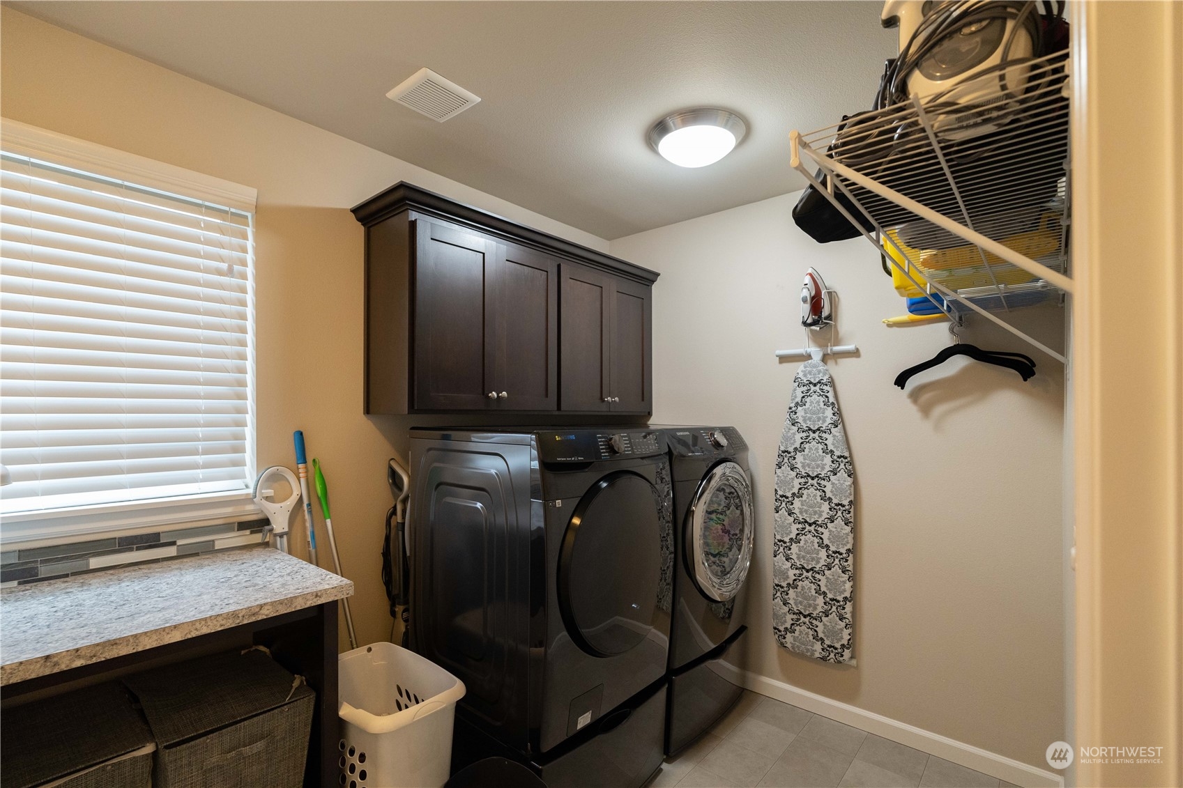 4731 Rosa Court Lacey, WA 98503 - Photo 29 of 31 a utility room with dryer and washer
