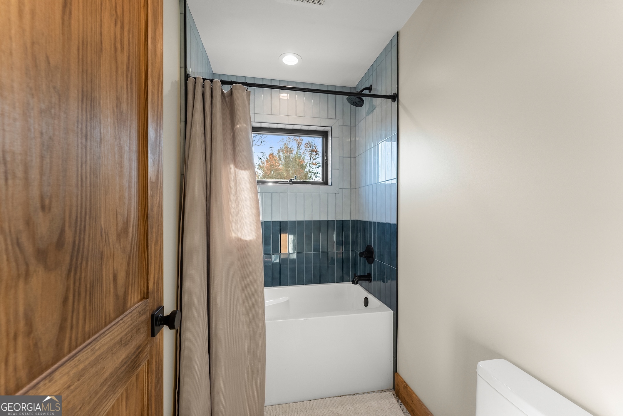 147 Jess Hunt Road West Cleveland, GA 30528 - Photo 44 of 69 a bathroom with a shower a toilet and a bathtub