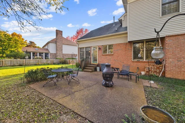 a view of a swimming pool with chairs
