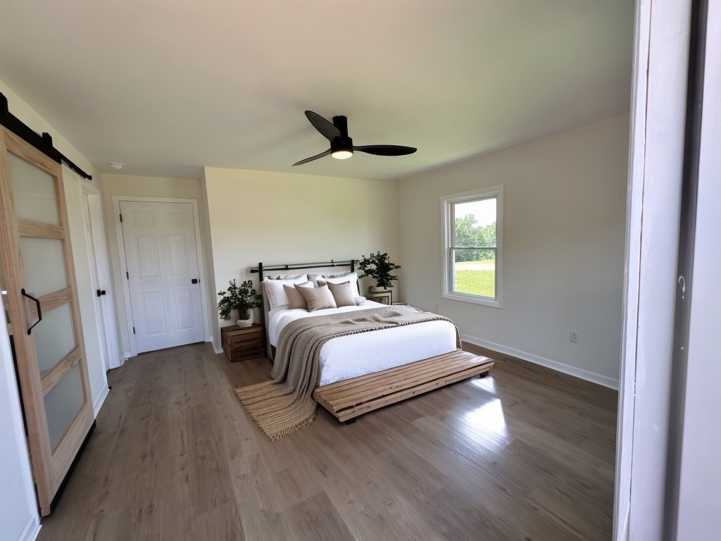 876 Ford Road White Bluff, TN 37187 - Photo 19 of 56 a bedroom with bed and a window