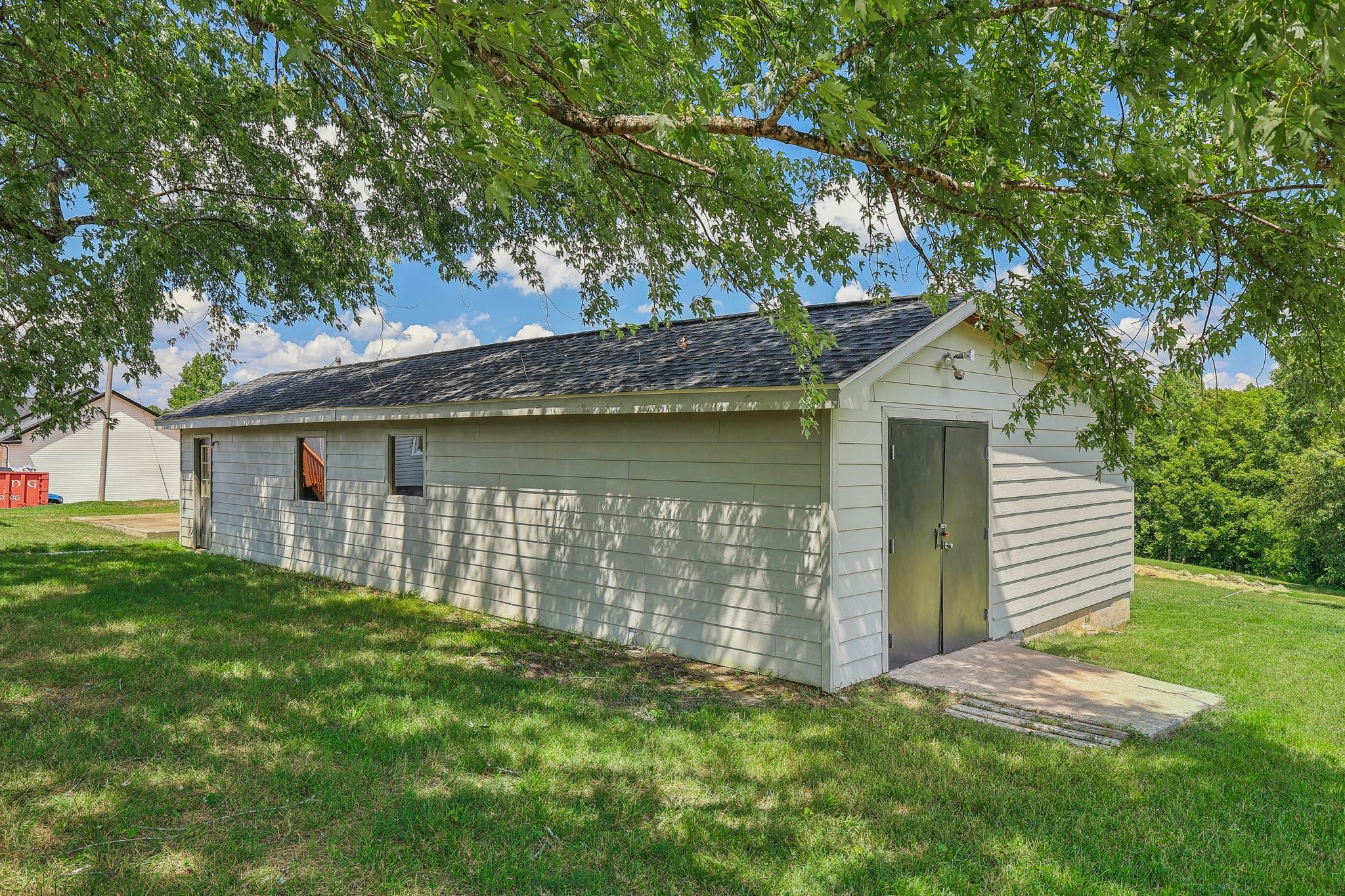 876 Ford Road White Bluff, TN 37187 - Photo 32 of 56 a view of a house with a yard