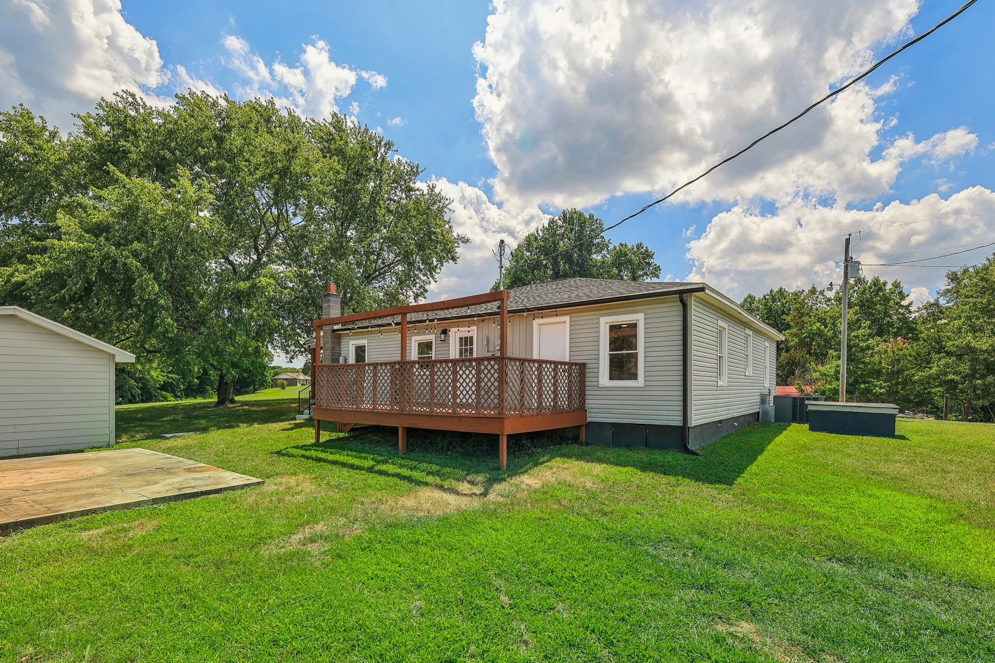 876 Ford Road White Bluff, TN 37187 - Photo 39 of 56 a view of a house with a backyard and a patio