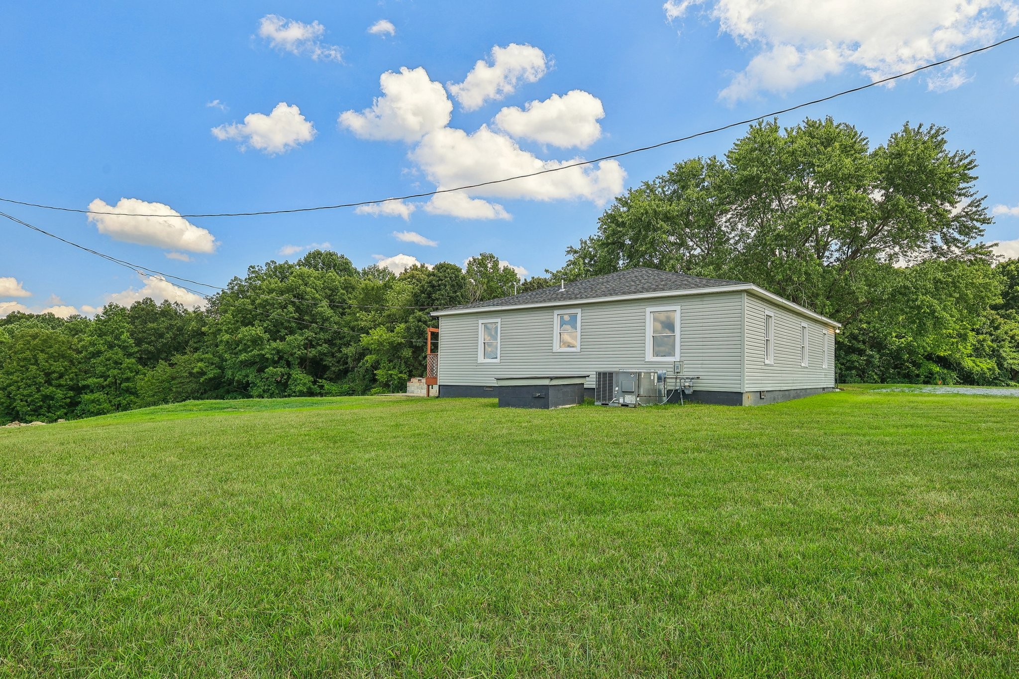 876 Ford Road White Bluff, TN 37187 - Photo 40 of 56 a front view of house with garden and trees