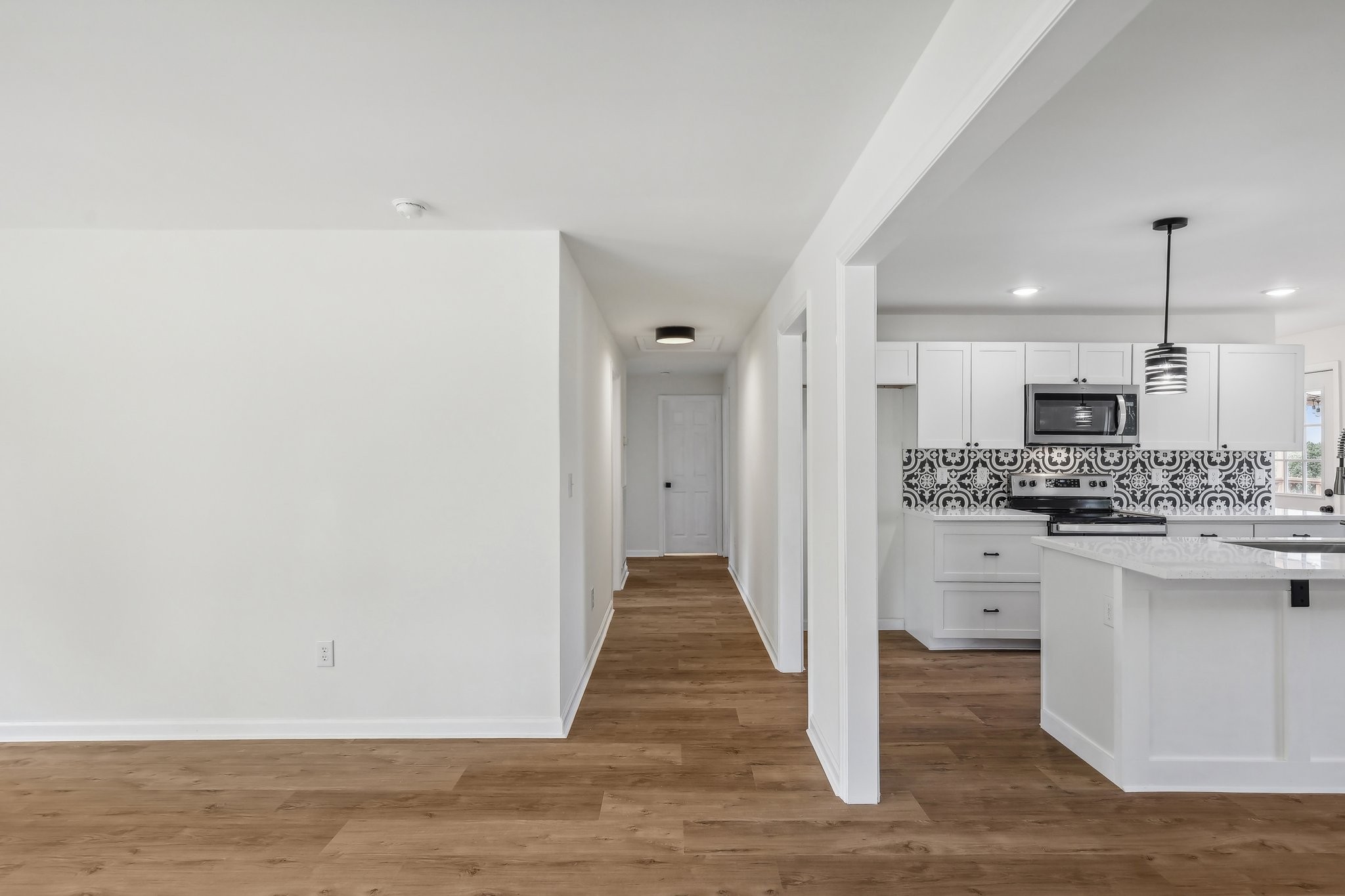 876 Ford Road White Bluff, TN 37187 - Photo 4 of 56 a view of kitchen with wooden floor