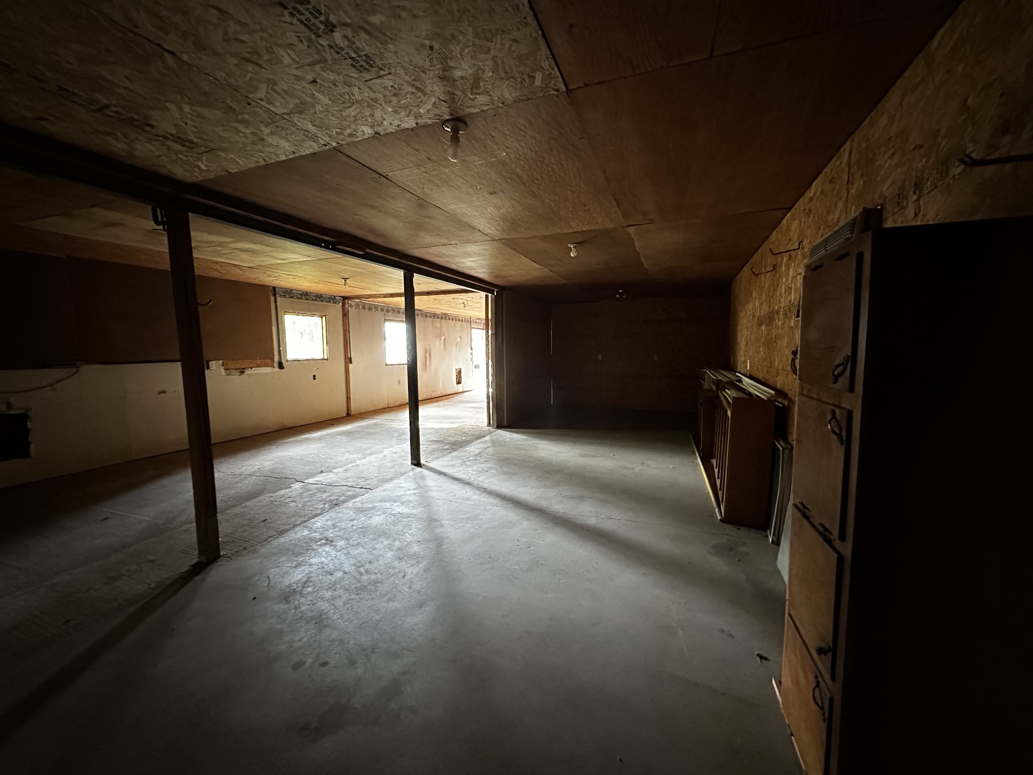 876 Ford Road White Bluff, TN 37187 - Photo 49 of 56 a view of empty room with wooden floor and fan