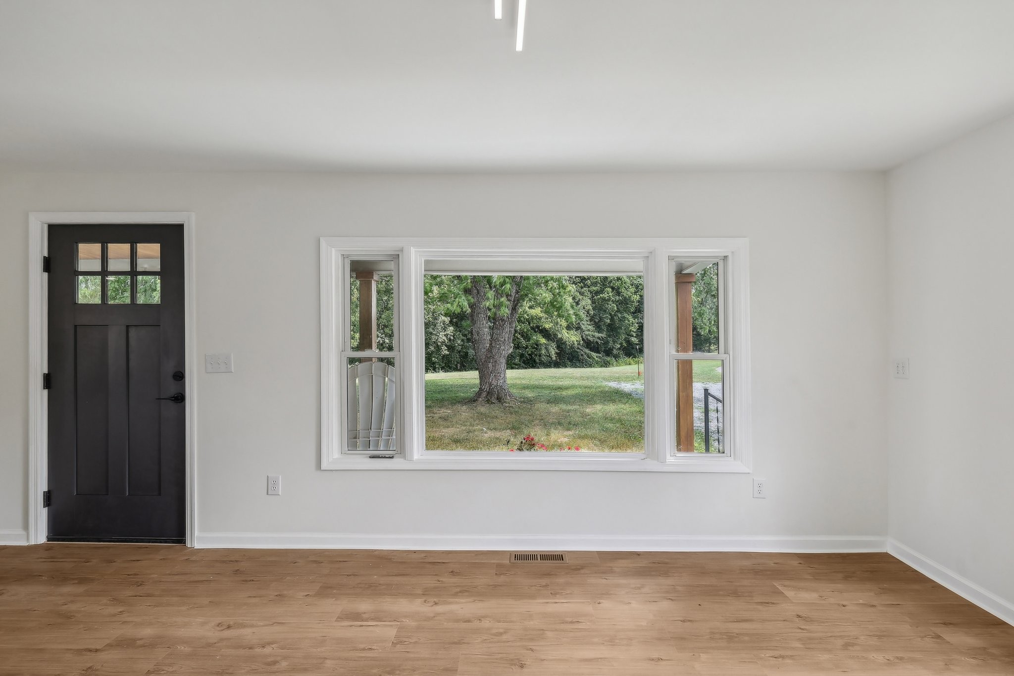 876 Ford Road White Bluff, TN 37187 - Photo 5 of 56 a view of a room that has a window in it