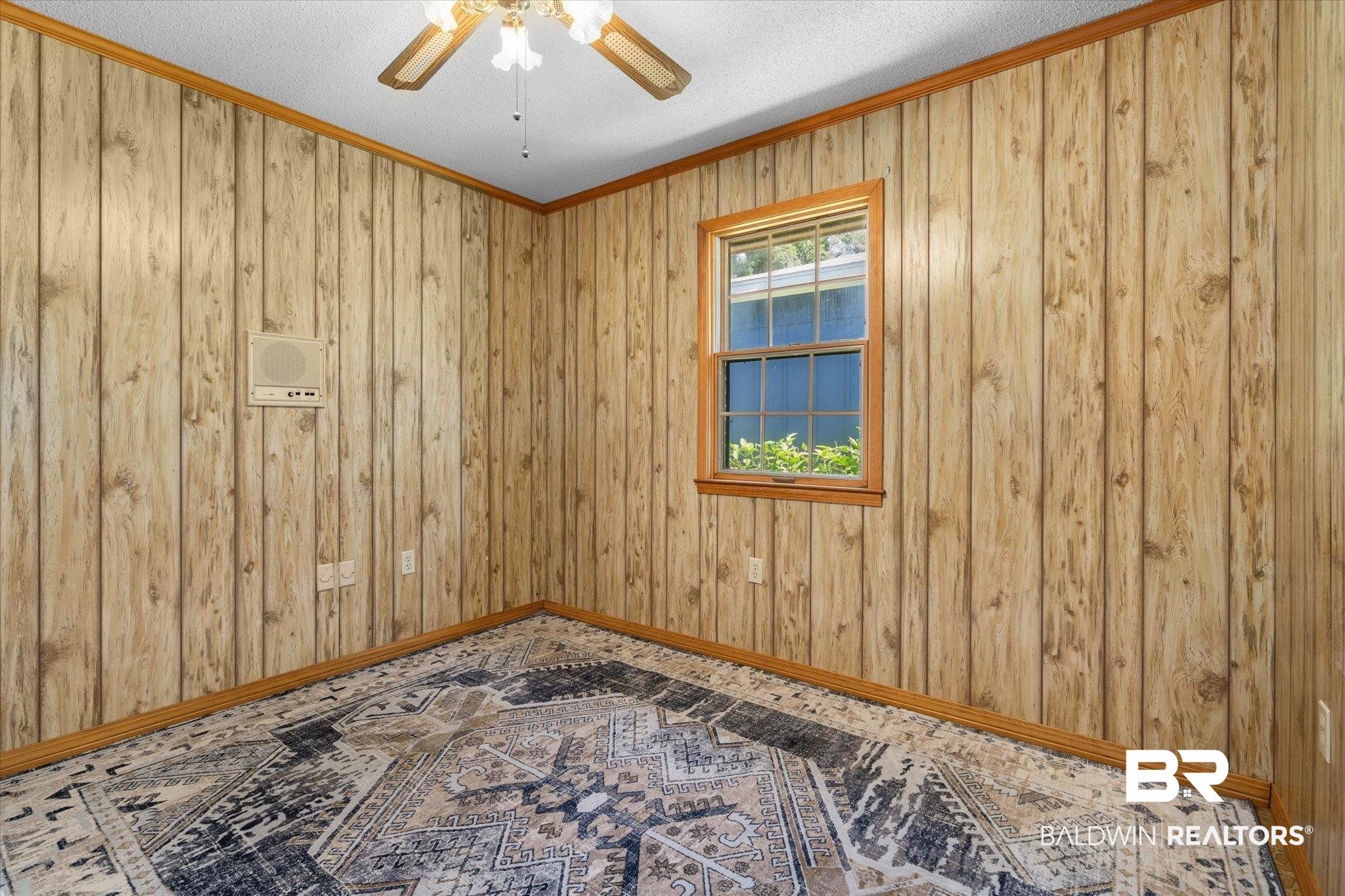 5503 Darring Street Satsuma, AL 36572 - Photo 25 of 31 Spare room with a ceiling fan and ornamental molding