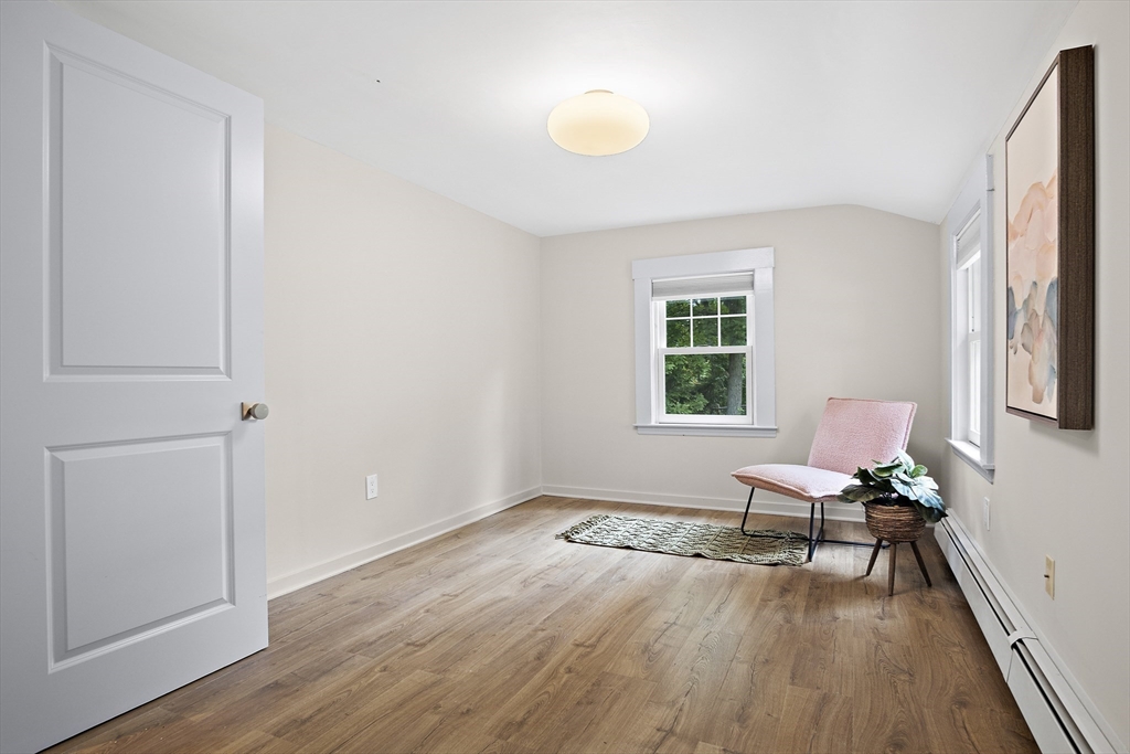 80 Evergreen Road Natick, MA 01760 - Photo 15 of 39 a view of a workspace with furniture and a window
