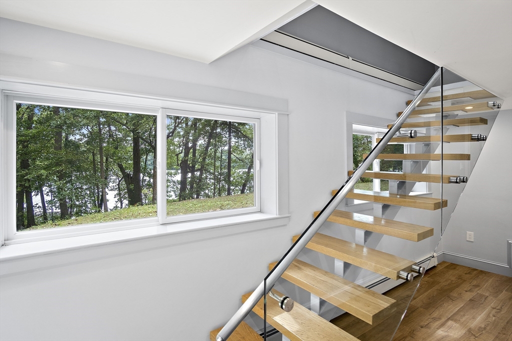 80 Evergreen Road Natick, MA 01760 - Photo 17 of 39 a view of staircase with white walls and windows