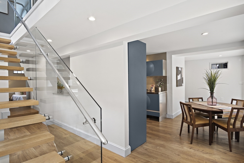 80 Evergreen Road Natick, MA 01760 - Photo 21 of 39 a view of entryway and hall with wooden floor
