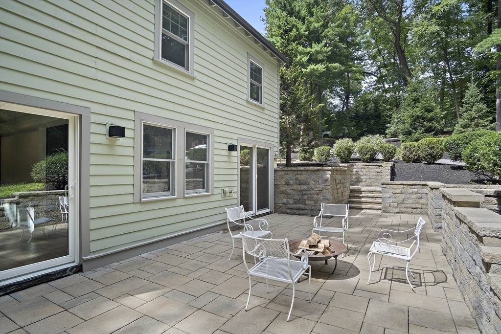 80 Evergreen Road Natick, MA 01760 - Photo 28 of 39 a view of a patio with couple of chairs