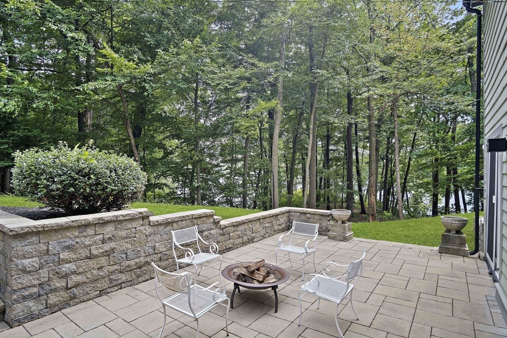 80 Evergreen Road Natick, MA 01760 - Photo 29 of 39 a view of backyard with seating area and green space