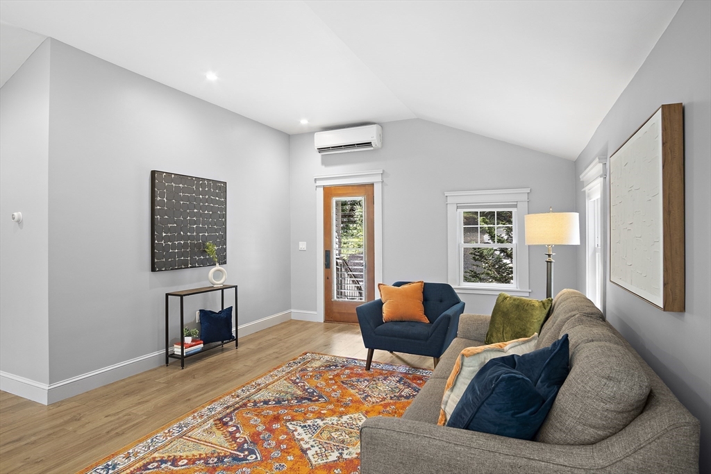 80 Evergreen Road Natick, MA 01760 - Photo 7 of 39 a living room with furniture and a window