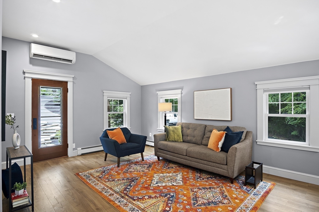 80 Evergreen Road Natick, MA 01760 - Photo 9 of 39 a living room with furniture and a window