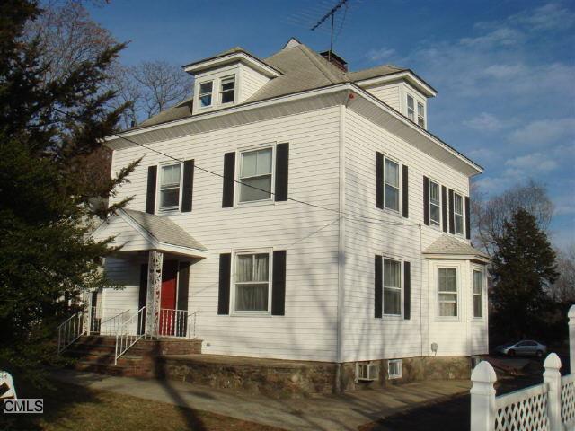 571 High Ridge Road Stamford, CT 06905 - Photo 1 of 1 a front view of a house with balcony