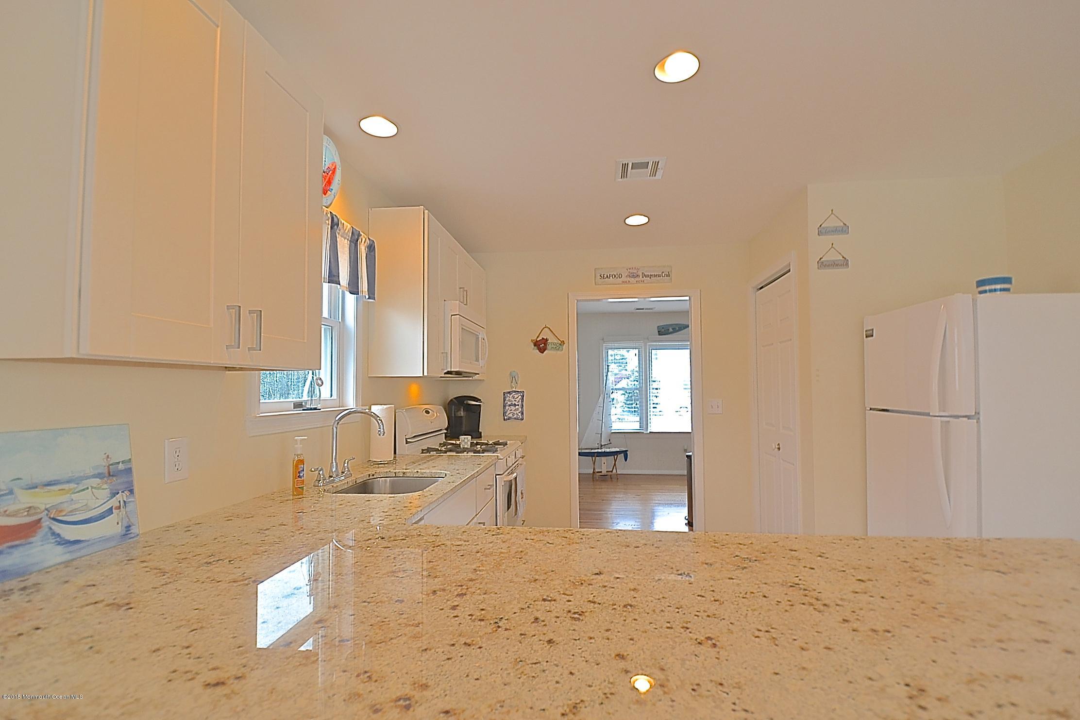 45 North Island Road Bayville, NJ 08721 - Photo 12 of 31 a large bathroom with a sink a toilet and a tub