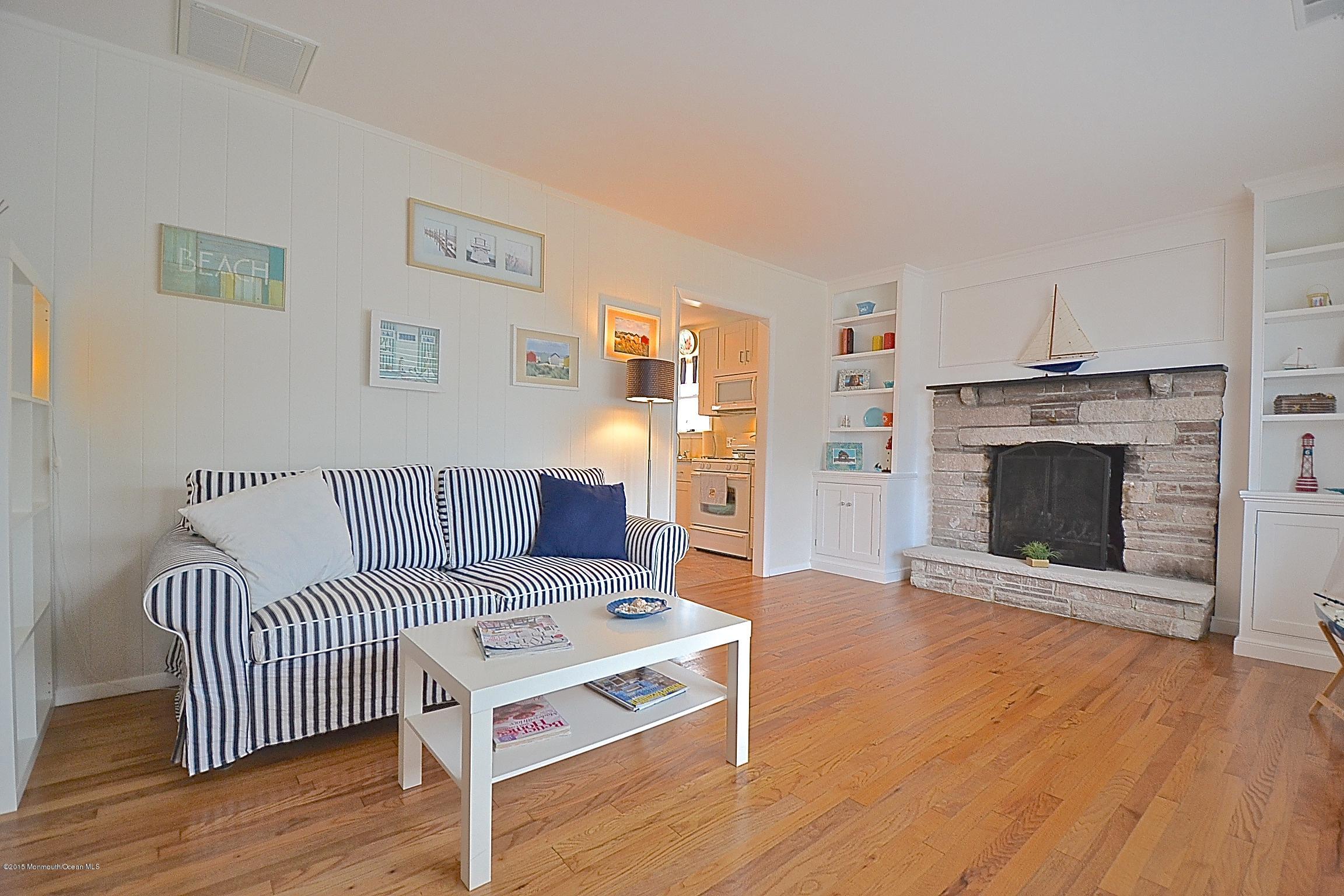 45 North Island Road Bayville, NJ 08721 - Photo 14 of 31 a living room with furniture and a fireplace