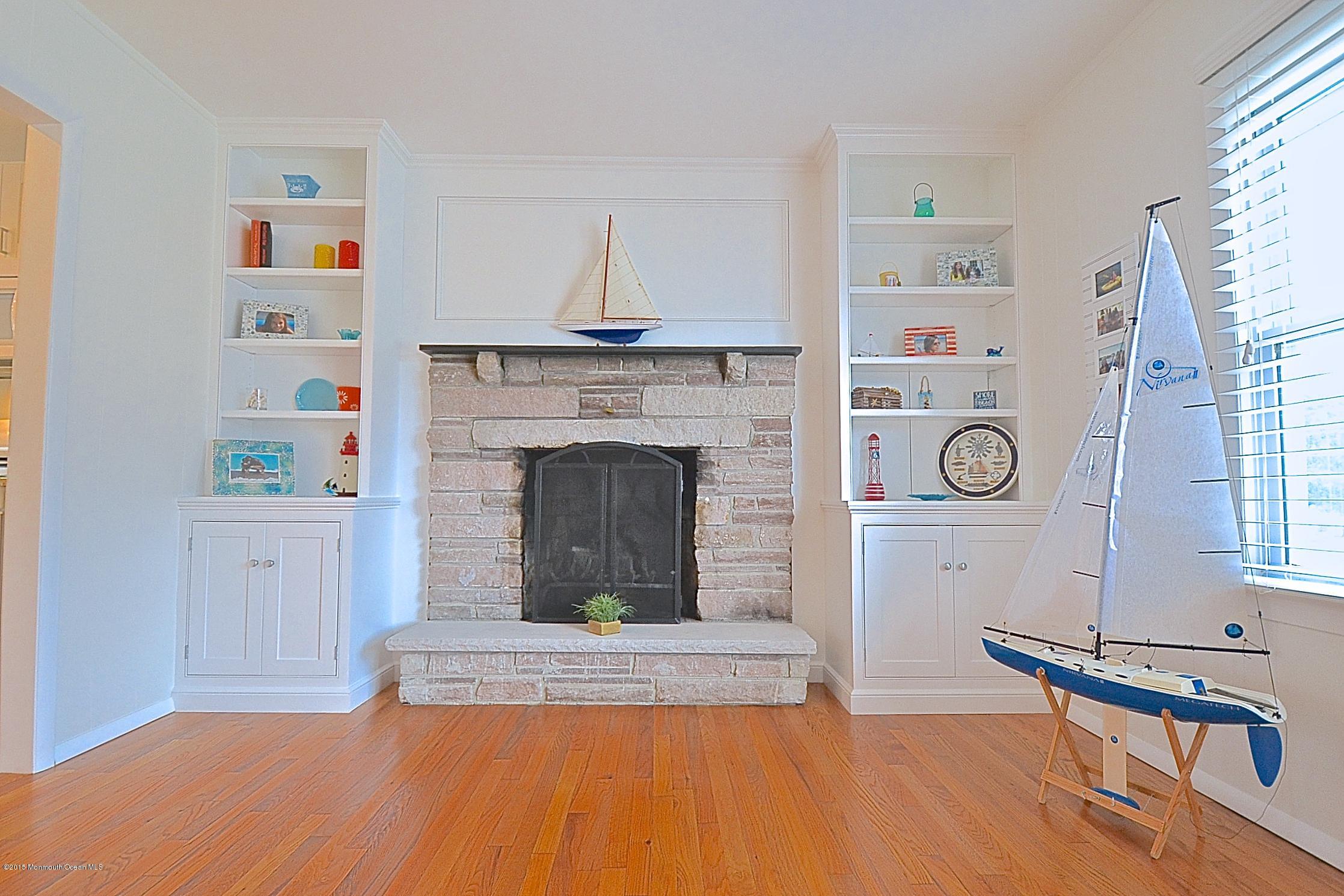 45 North Island Road Bayville, NJ 08721 - Photo 15 of 31 a living room with furniture and a fireplace