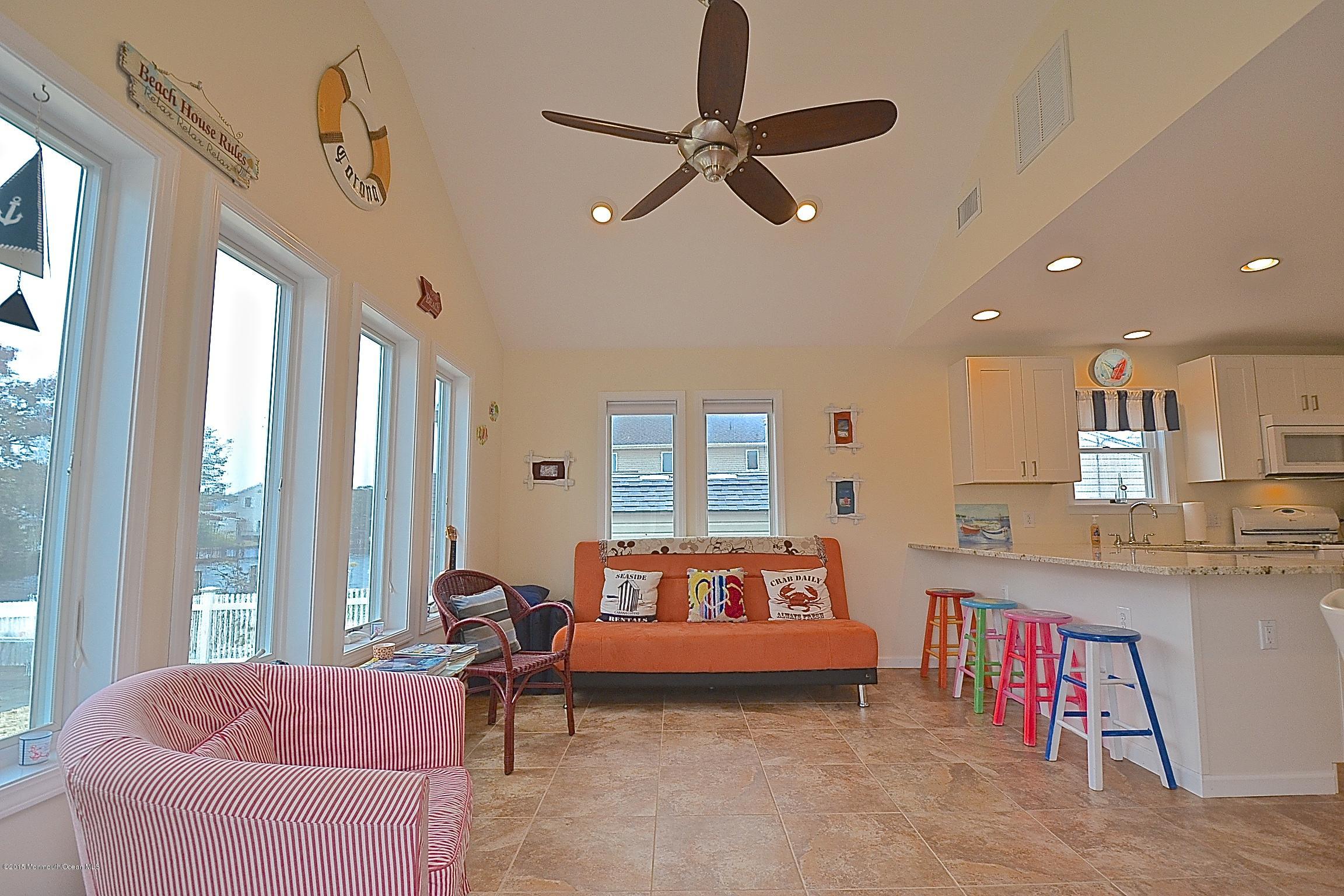 45 North Island Road Bayville, NJ 08721 - Photo 7 of 31 a living room with furniture and a window