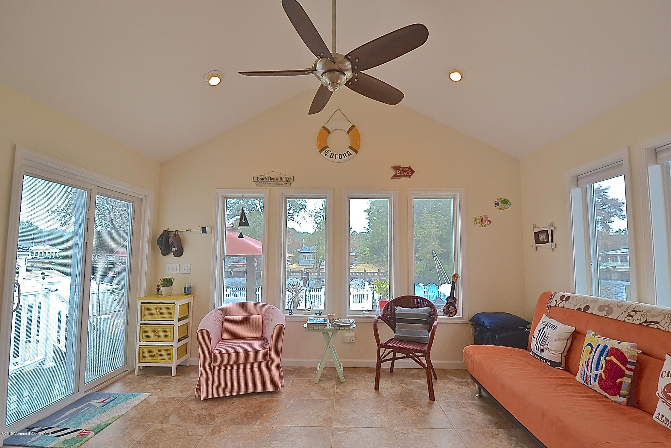 45 North Island Road Bayville, NJ 08721 - Photo 8 of 31 a living room with furniture and a large window