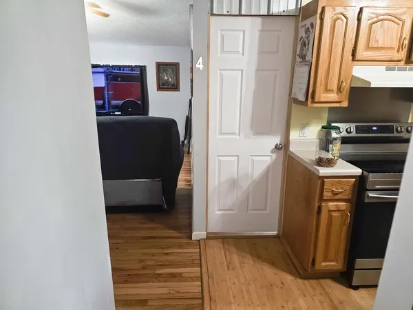 a dining room with a table and chairs