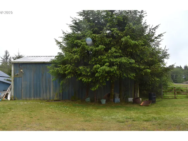 a backyard of a house with lots of green space