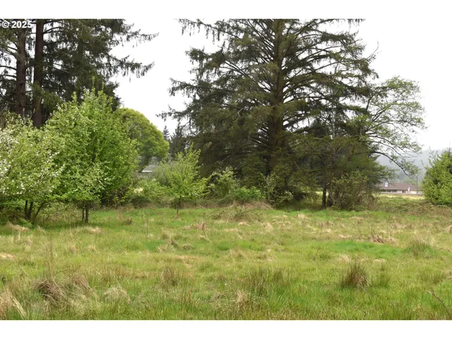 a fire hydrant in the middle of a field