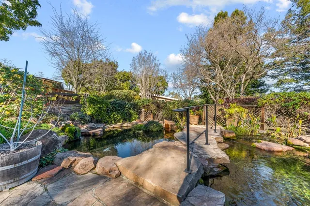 a view of a city with mountains in the background