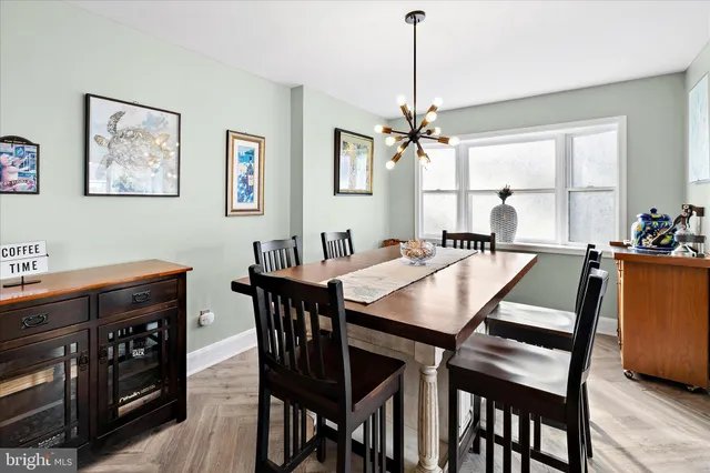 a bathroom with a sink a mirror and a toilet