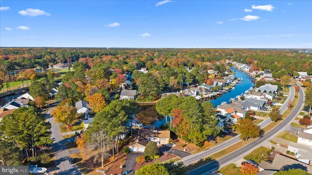 an aerial view of residential building and ocean