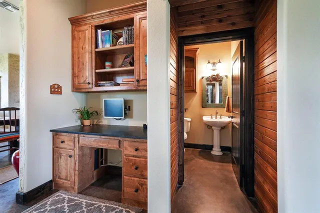 a view of a bathroom from a hallway