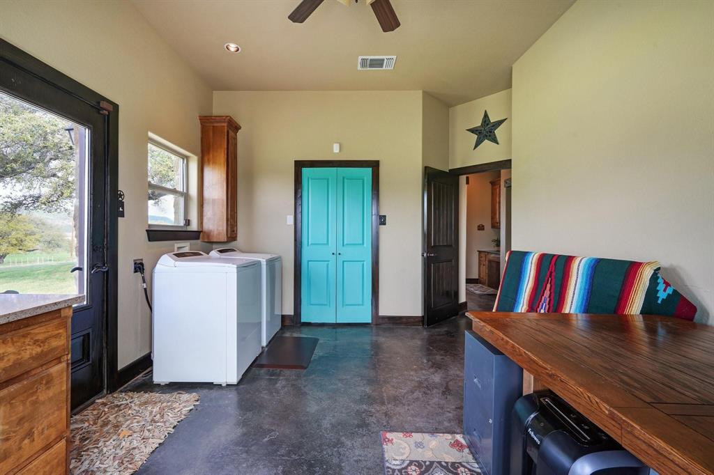 1084 Beddo Mountain Road Santo, TX 76472 - Photo 16 of 40 a view of kitchen with furniture and refrigerator