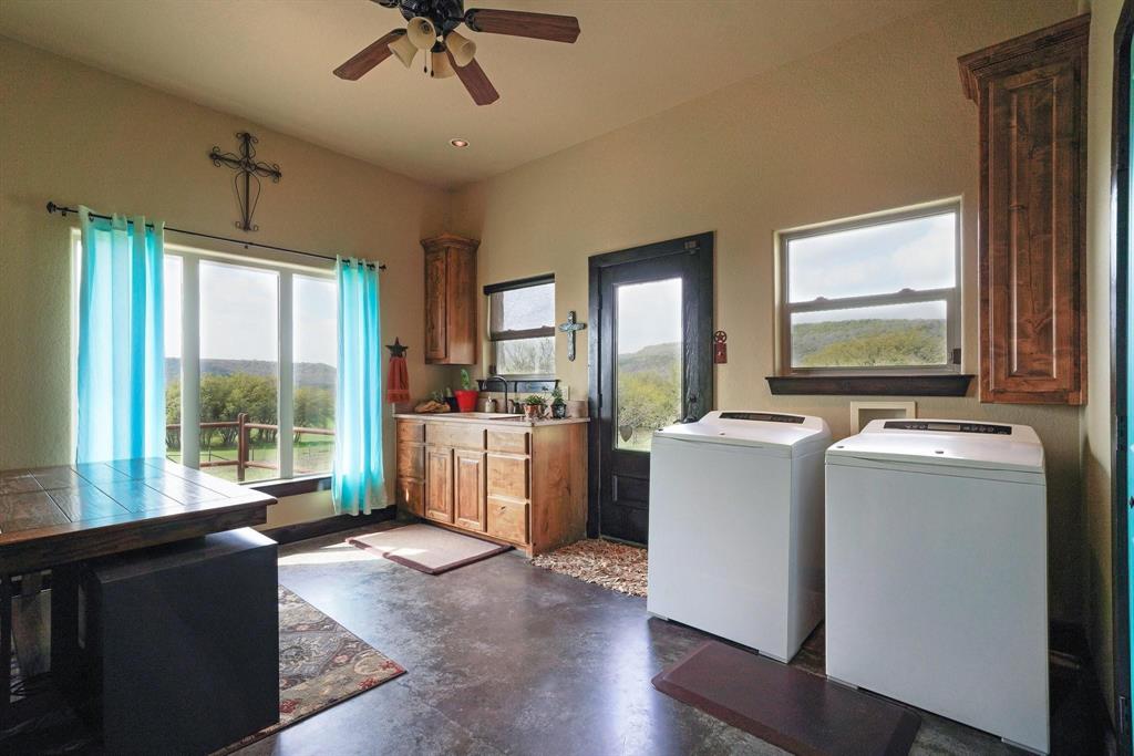 1084 Beddo Mountain Road Santo, TX 76472 - Photo 17 of 40 a room with storage and utility