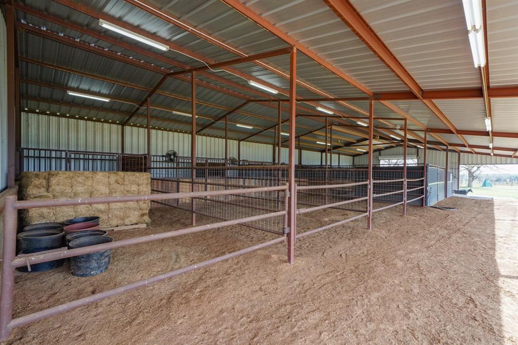 1084 Beddo Mountain Road Santo, TX 76472 - Photo 23 of 40 a view of a room with wooden floor