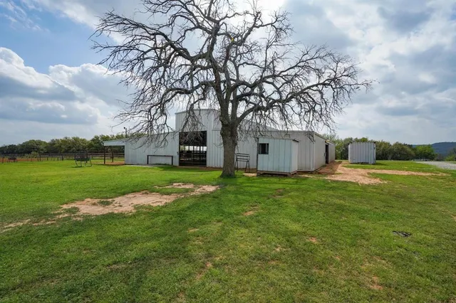 a backyard of a house with lots of green space