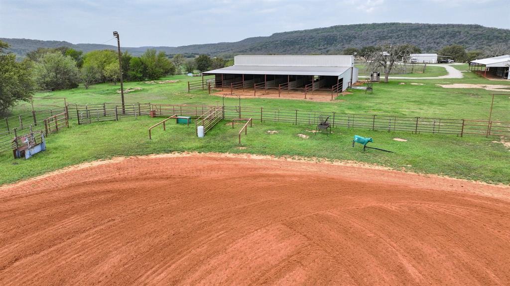 1084 Beddo Mountain Road Santo, TX 76472 - Photo 31 of 40 a view of a house with a yard