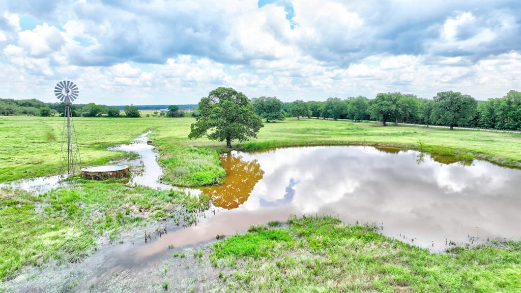 1084 Beddo Mountain Road Santo, TX 76472 - Photo 37 of 40 a view of a lake with a big yard