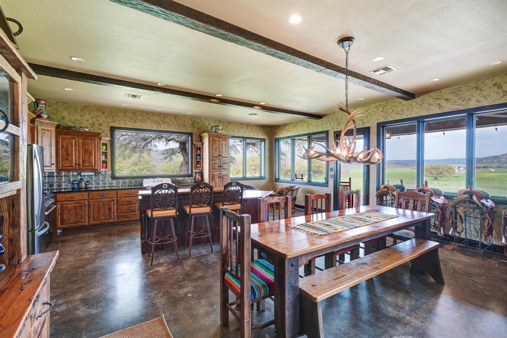 1084 Beddo Mountain Road Santo, TX 76472 - Photo 7 of 40 a very nice looking living room with a large window