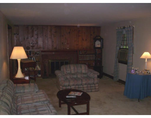 3 Pine Ridge Road Topsfield, MA 01983 - Photo 16 of 29 a living room with furniture and a fireplace