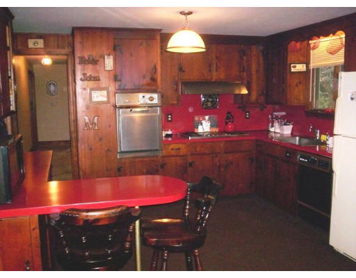 3 Pine Ridge Road Topsfield, MA 01983 - Photo 3 of 29 a kitchen with a sink cabinets and wooden floor