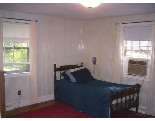 3 Pine Ridge Road Topsfield, MA 01983 - Photo 6 of 29 a bedroom with a bed and a window