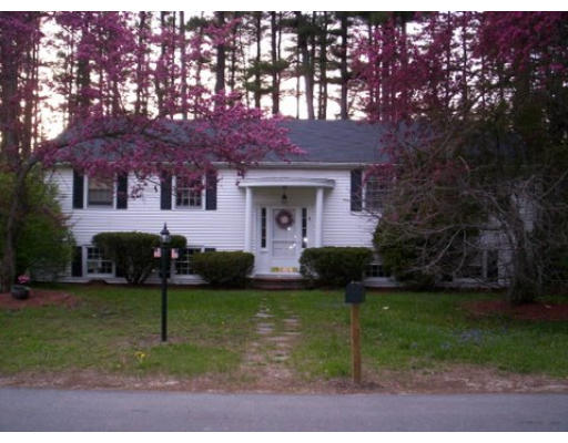3 Pine Ridge Road Topsfield, MA 01983 - Photo 10 of 29 a front view of a house with a yard