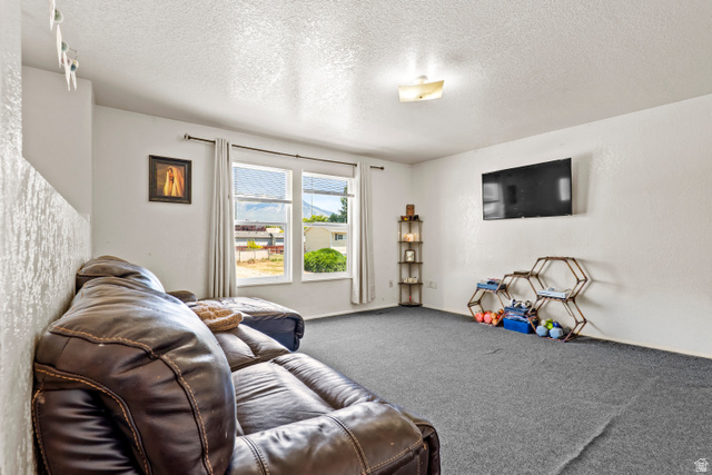 2327 880 North Provo, UT 84601 - Photo 5 of 15 Spacious room featuring neutral carpeting and white walls