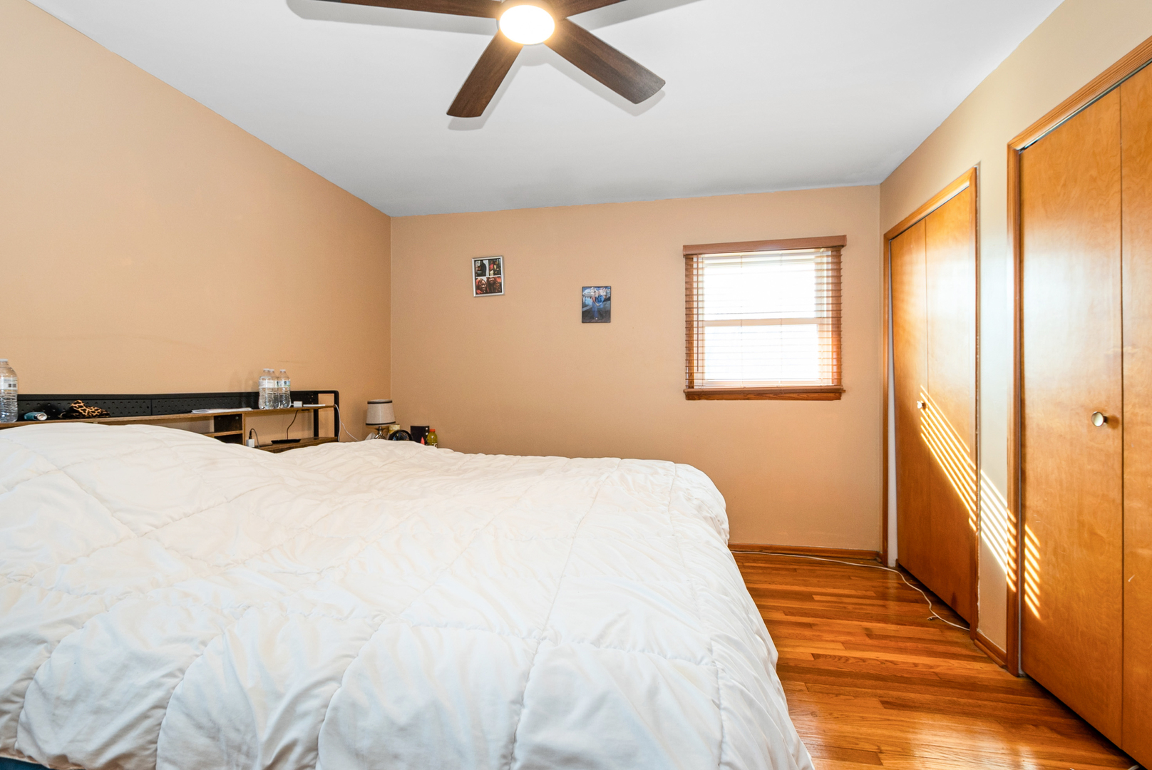 2809 Forest Lane Lansing, IL 60438 - Photo 11 of 24 a bedroom with a bed and wooden floor