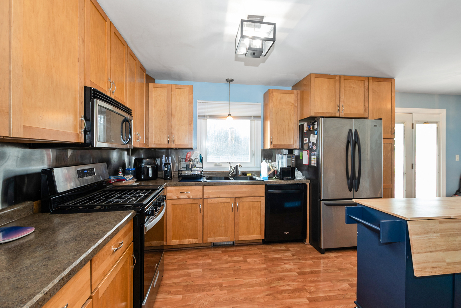 2809 Forest Lane Lansing, IL 60438 - Photo 5 of 24 a kitchen with a refrigerator and a stove top oven