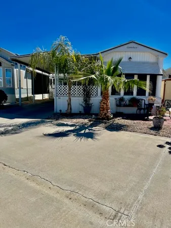 front view of a house with a patio