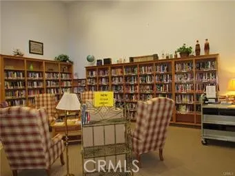 a view of a patio with a table and chairs