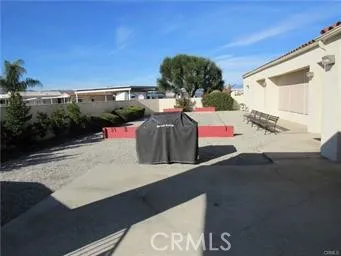 a view of a yard and sign board