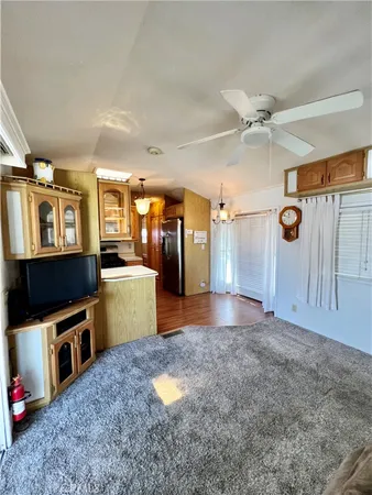 a view of a kitchen with furniture and a kitchen