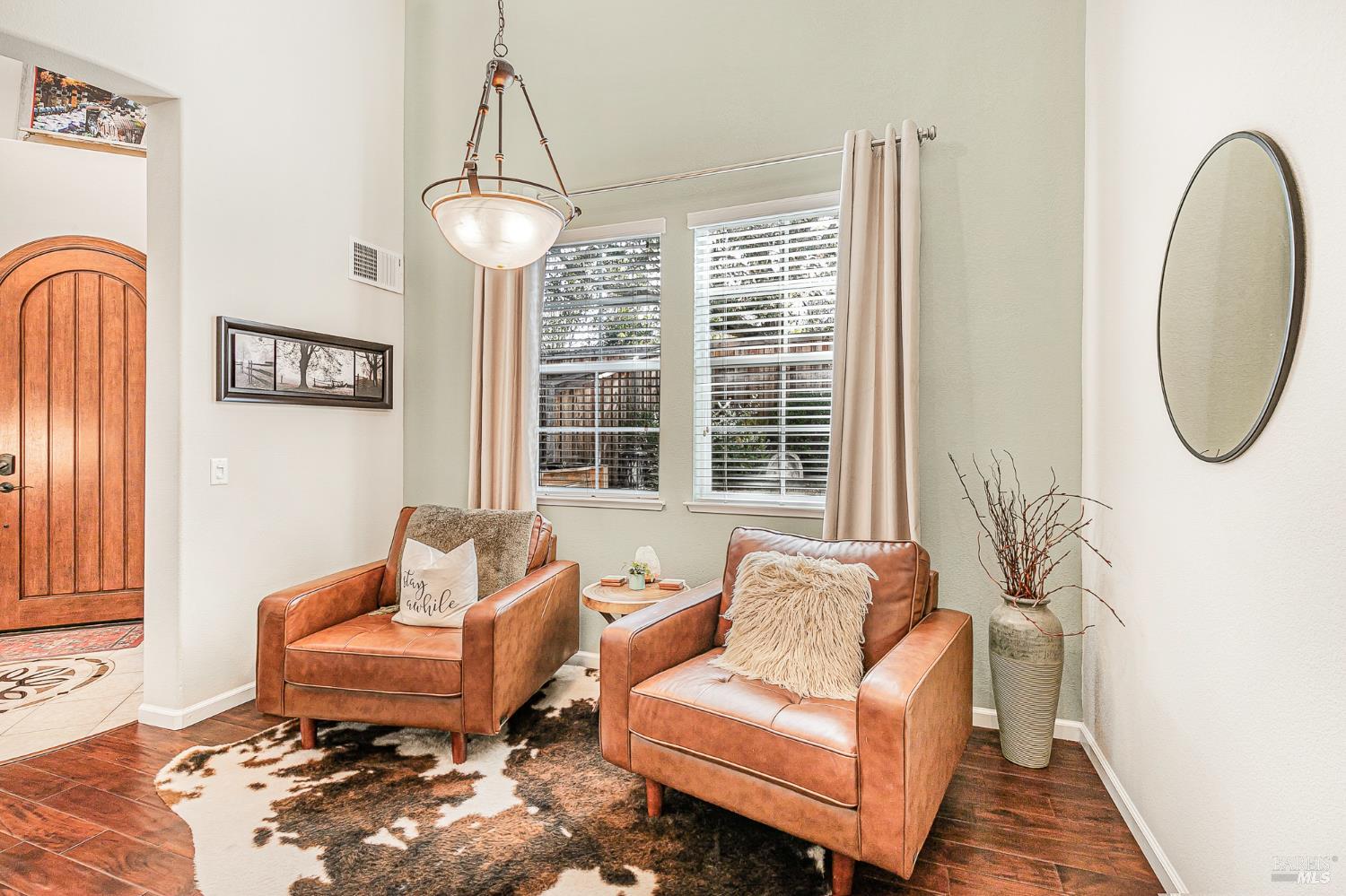 2167 Linwood Avenue Santa Rosa, CA 95404 - Photo 14 of 80 a living room with furniture a window and a chandelier